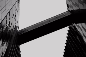 Modern skybridge connecting two glass buildings